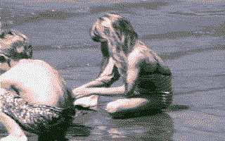 Image: child playing on the beach