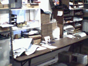Image: Once the invoices are made, Lea-Anne takes them out to the stockroom.