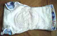 Image: 2. Place diaper on top of diaper wrap